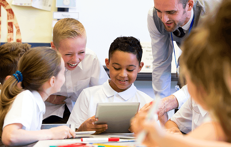 Students flipping the script Diverse group of elementary school children