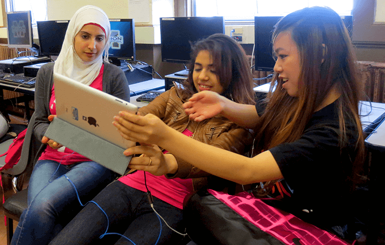 Students flipping the script Diverse group of elementary school children