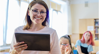 Teacher with students in classroom