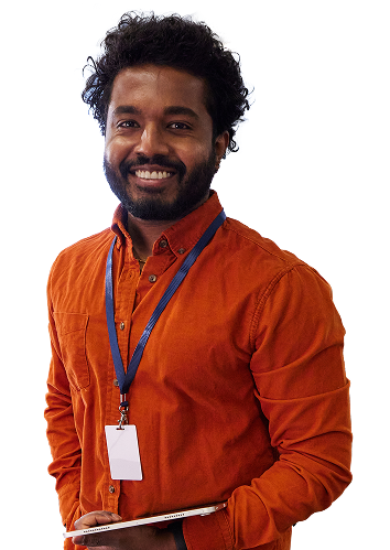 Smiling man in an orange shirt with a blue lanyard, holding a tablet